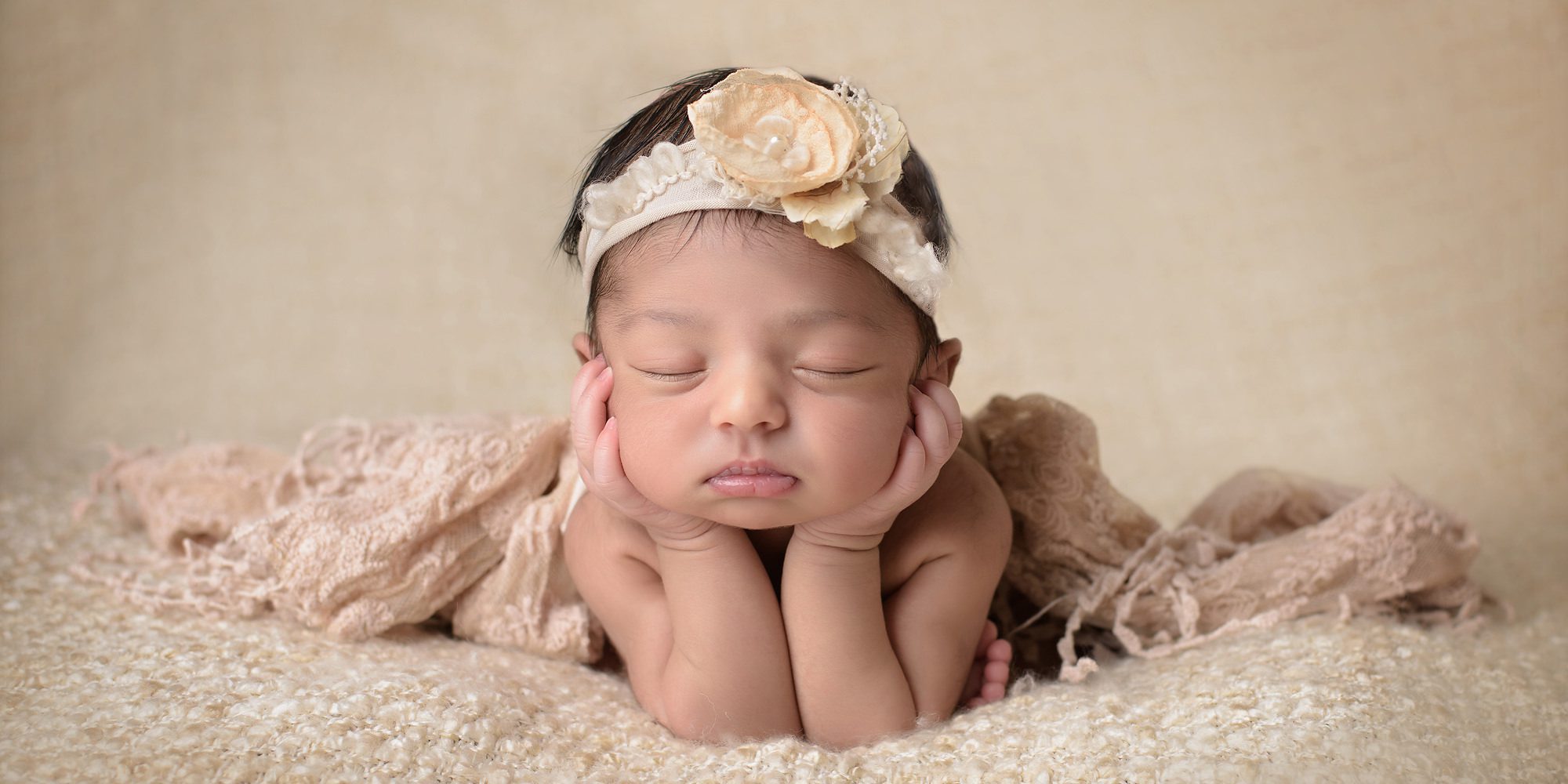 newborn girl flowers and lace