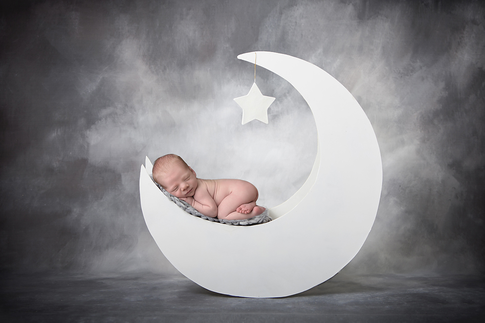Newborn Boy and Moon Prop