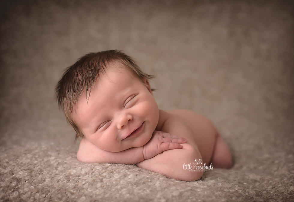 newborn baby boy smile