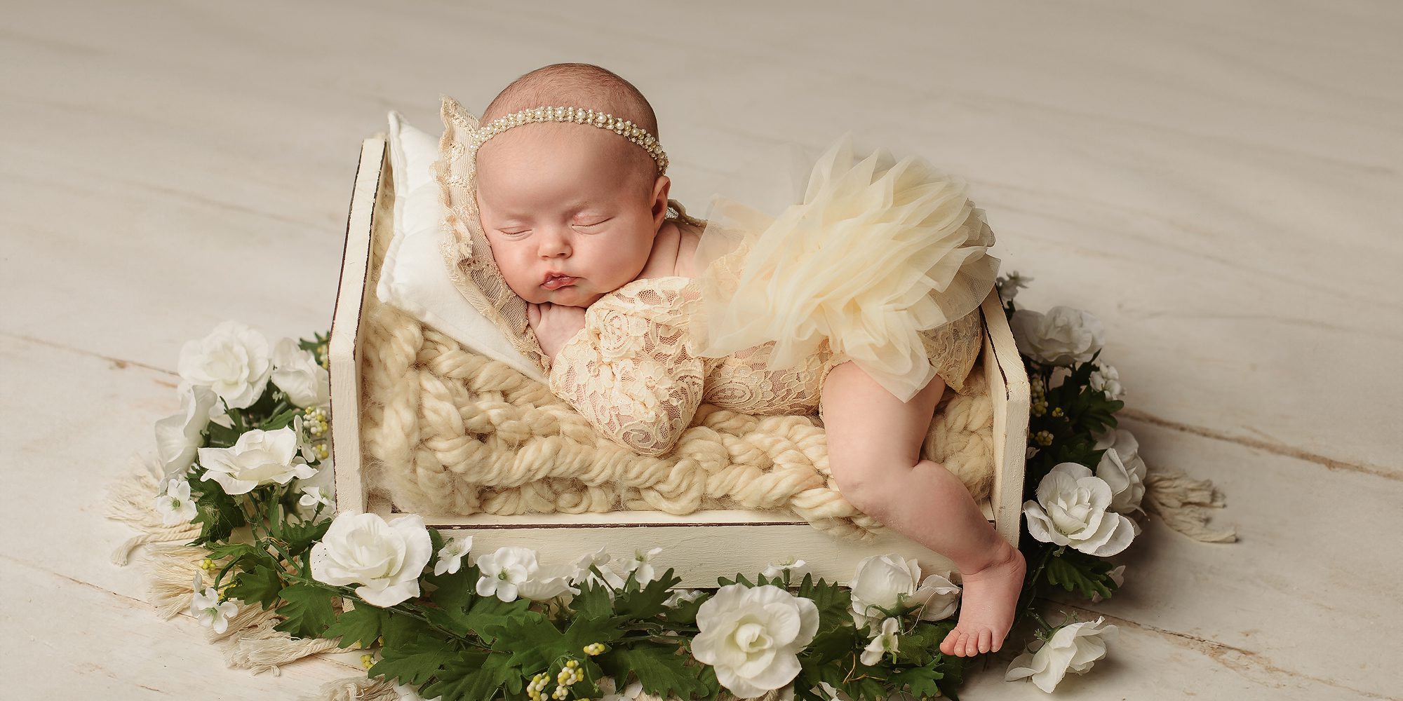 A newborn baby in a posed newborn session in Mississauga Ontario